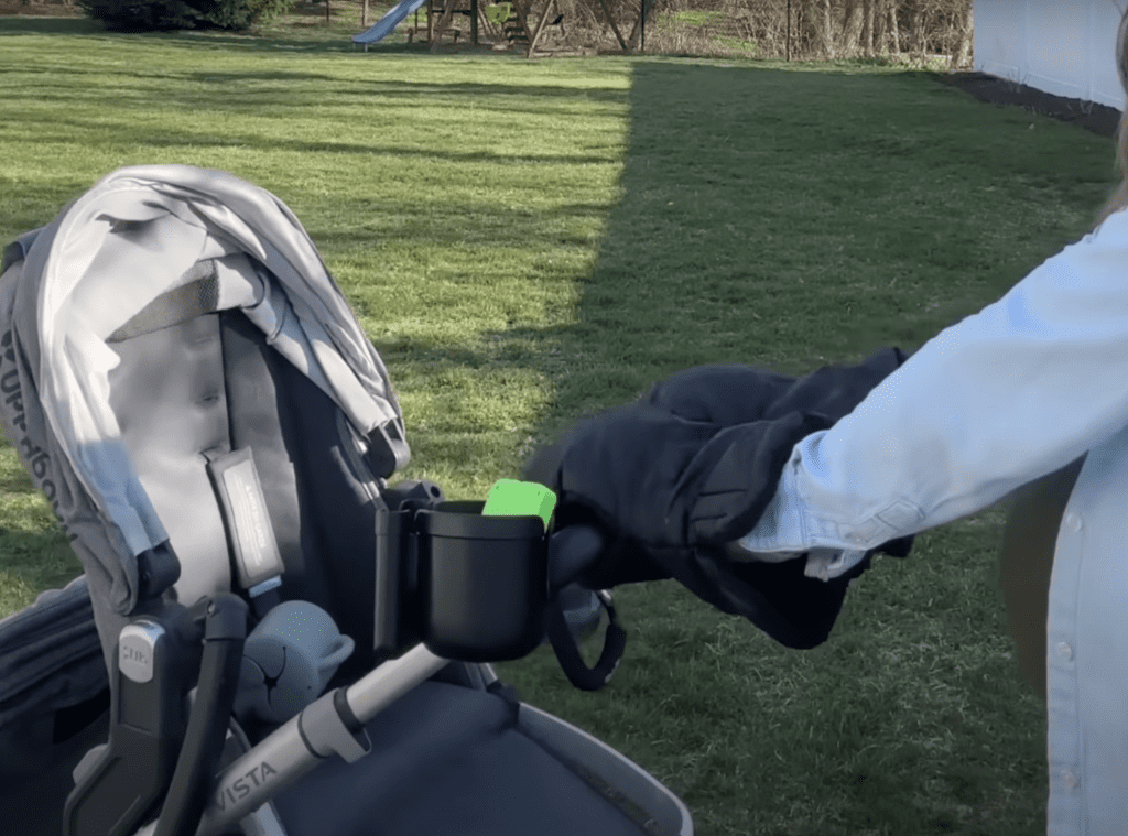 Gloves that stay on stroller handle.